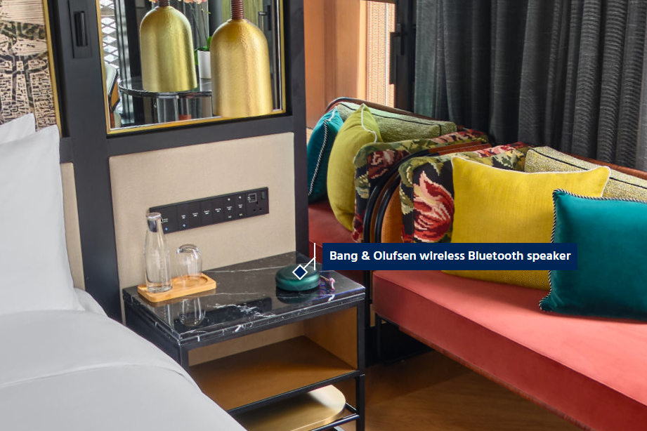 Hotel virtual tour InfoTag feature showing descriptive tag on furniture item
