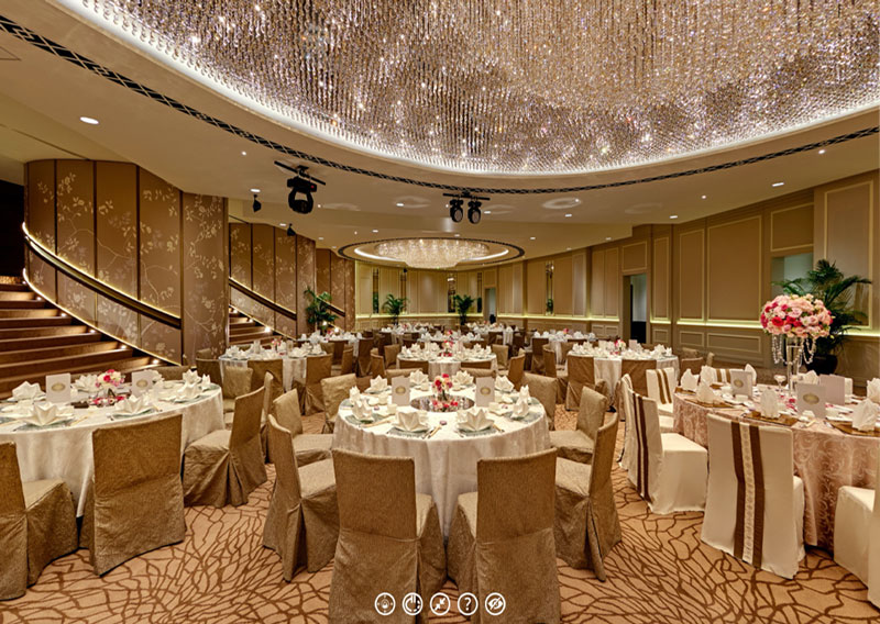 Hotel virtual tour of Fullerton Hotel Singapore Tempo bar with copper counter, bartender, and illuminated bottle shelves